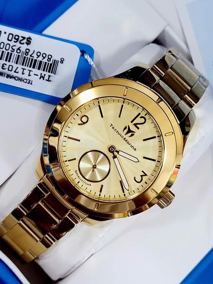 TechnoMarine MoonSun TM719030 Watch (Category: Women's Watches) located in Manila. Submitted by annafinds (Listing ID 1228217971, Image 3). Description: ORIGINAL/AUTHENTIC US BOUGHT MONEYBACK GUARANTEED IF PROVEN FAKE Case and Dial Case Size: 42mm Case Material: Stainless Steel Bezel Material: Stainless Steel Bezel Color: Gold Crown Type: Push Crystal Type: Flame Fusion Dial Material: Metal Movement Caliber: VD78 Function Type: Quartz Water Resis
