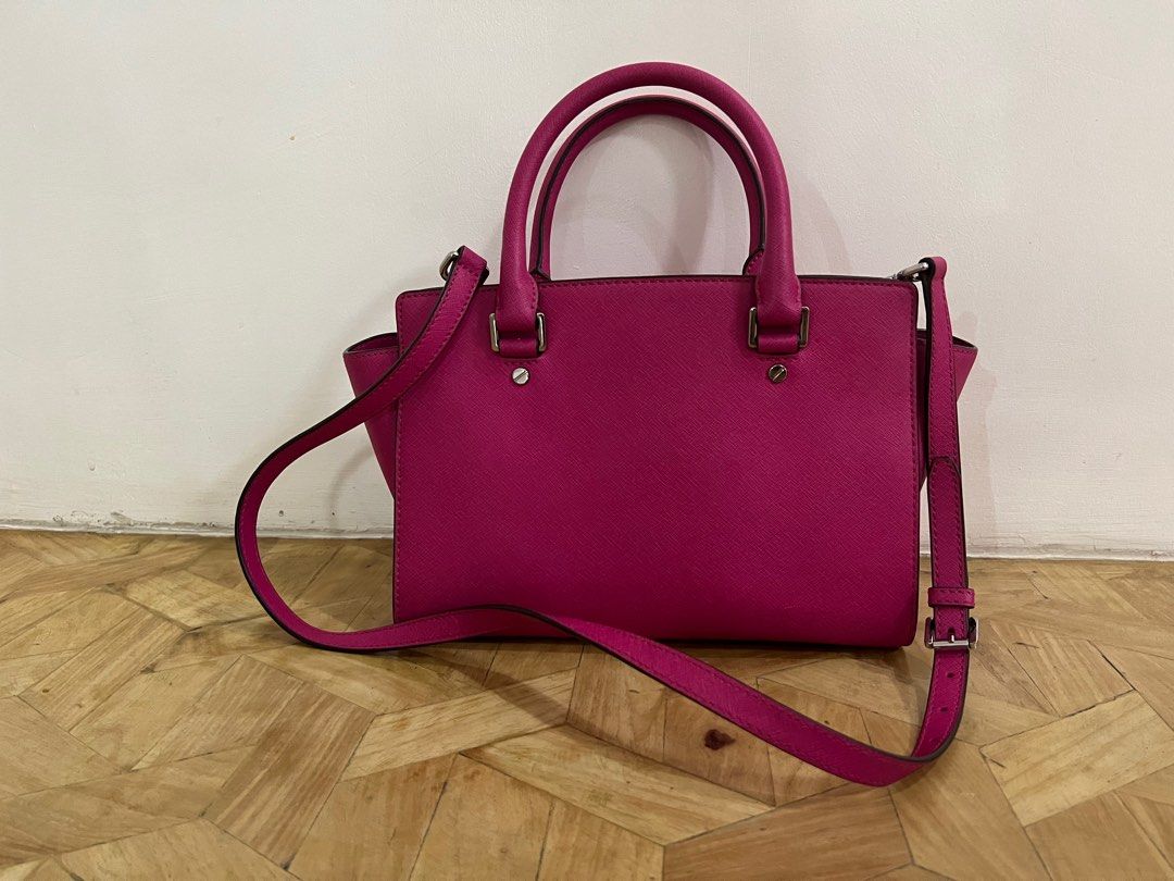 Rush Authentic Michael Kors (40% Off) (Category: Luxury Bags & Wallets) located in Quezon City. Submitted by wantstodeclutter (Listing ID 1228365130, Image 3). Description: Guaranteed Authentic. Color Hot Pink Husband bought this for me in Canada for 350 CAD (15k pesos) Like new. Used for less than 10 times only. Just some signs of usage and unnoticeable scratches (shown in pictures). .