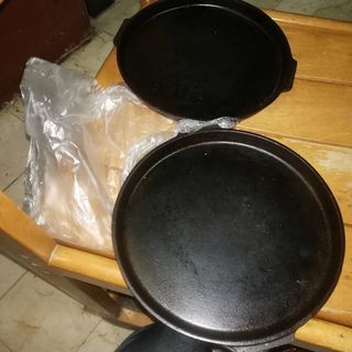 cast iron plates, and ashtray