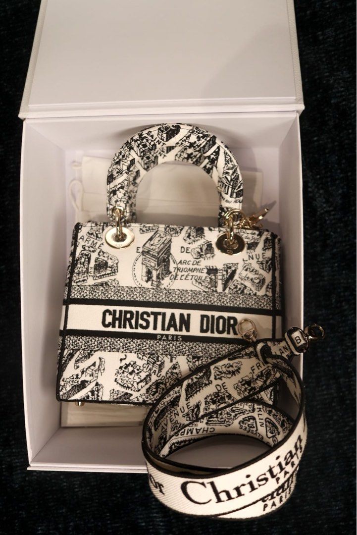 Dior Medium Lady D-Lite Bag (Category: Luxury Bags & Wallets) located in Makati City. Submitted by irenerv (Listing ID 1228346771, Image 3). Description: Christian Dior MEDIUM LADY D-LITE BAG White and Black Plan de Paris Embroidery Comes complete with box, card, dustbag Dimensions: 24 x 20 x 11 cm / 9.5 x 8 x 4.5 inches Now retails for ₱295,000 Open for layaway. Serious buyers only please 🙏🏻 #luvluxe .