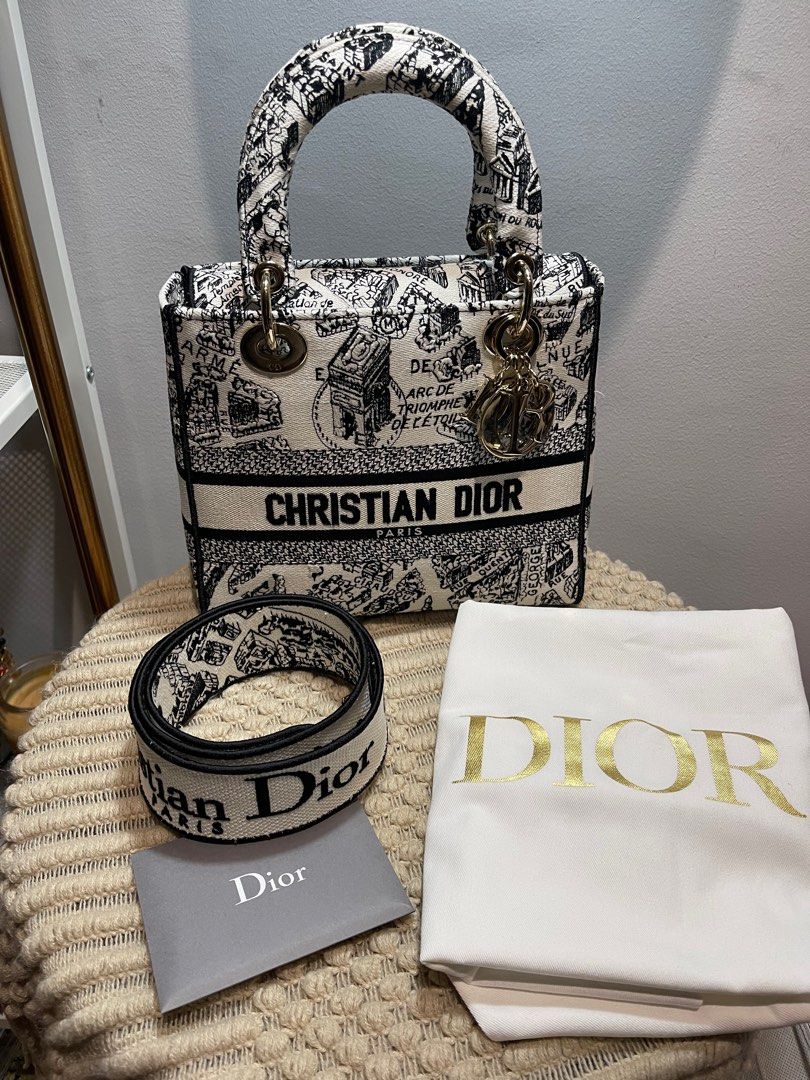 Dior Medium Lady D-Lite Bag (Category: Luxury Bags & Wallets) located in Makati City. Submitted by irenerv (Listing ID 1228346771, Image 1). Description: Christian Dior MEDIUM LADY D-LITE BAG White and Black Plan de Paris Embroidery Comes complete with box, card, dustbag Dimensions: 24 x 20 x 11 cm / 9.5 x 8 x 4.5 inches Now retails for ₱295,000 Open for layaway. Serious buyers only please 🙏🏻 #luvluxe .