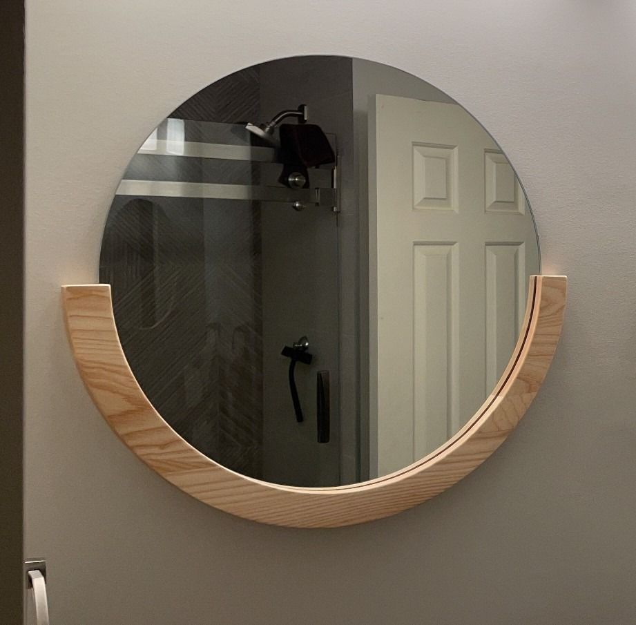Imported Modern Minimalist Round Wall Mirror (Category: Mirrors) located in Las Pinas. Submitted by aron.aron (Listing ID 1228390161, Image 1). Description: Modern Stylish Wall Mirror Wooden base 22.5" (57cm) Very Good Condition Can be pick-up in Las Pinas near City Hall.