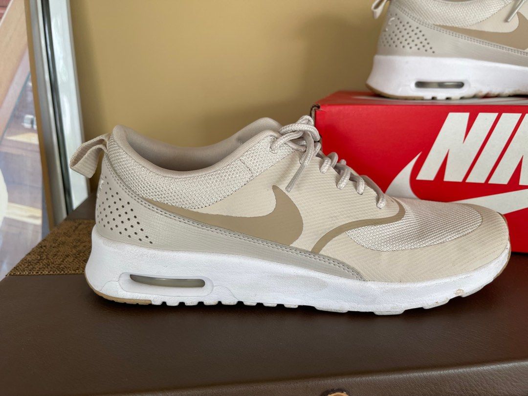 Beige nike thea online