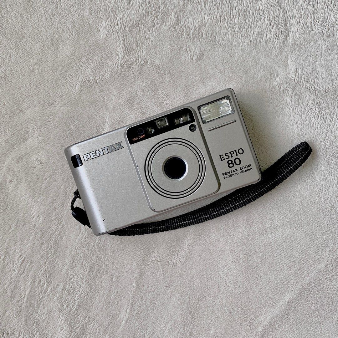 Pentax Espio 80 Film Camera (Category: Cameras) located in Quezon City. Submitted by joolei.declutter (Listing ID 1224263708, Image 1). Description: 🚫 no haggling please, last price posted! 💗discounts available when buying multiple products 🛍️ valued at 3,750 🛒 bought from @filmthriftshop on IG ❓RFS: not being used, no time to fix pressure plates ✅ 35mm - 80mm ✅ working flash ✅ fully automatic ✅ straps 👉 minor scratches due to age, bought at