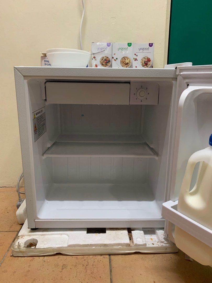 Selling brand new refrigerator with mini freezer for 100, TV & Home