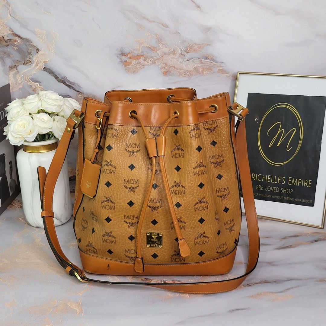 MCM Mini Bucket Sling Bag, Luxury, Bags & Wallets on Carousell