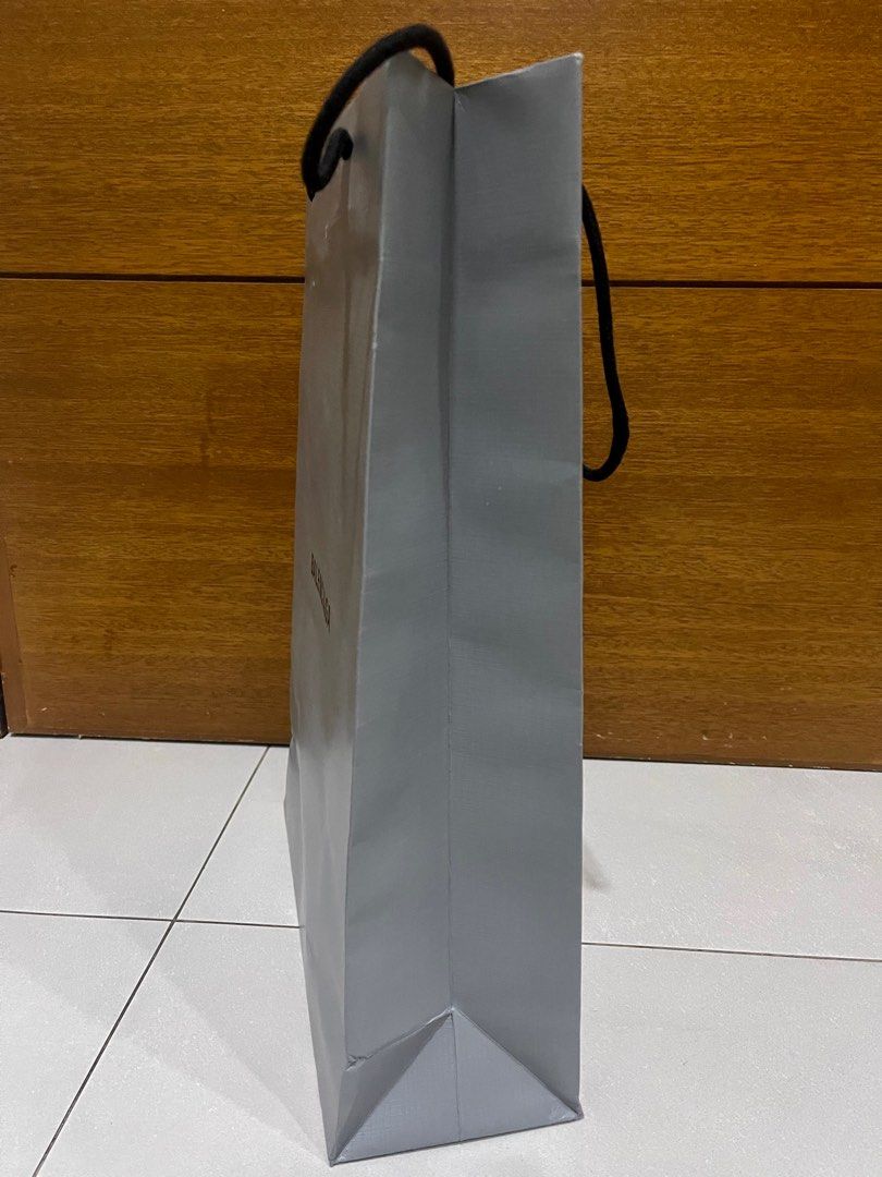 Balenciaga paper bag (Category: Luxury Accessories) located in Manila. Submitted by chinchinshaven (Listing ID 1228490696, Image 3). Description: Very Good condition Size :height 45.5cm Width 32.5cm Depth 12.5cm .