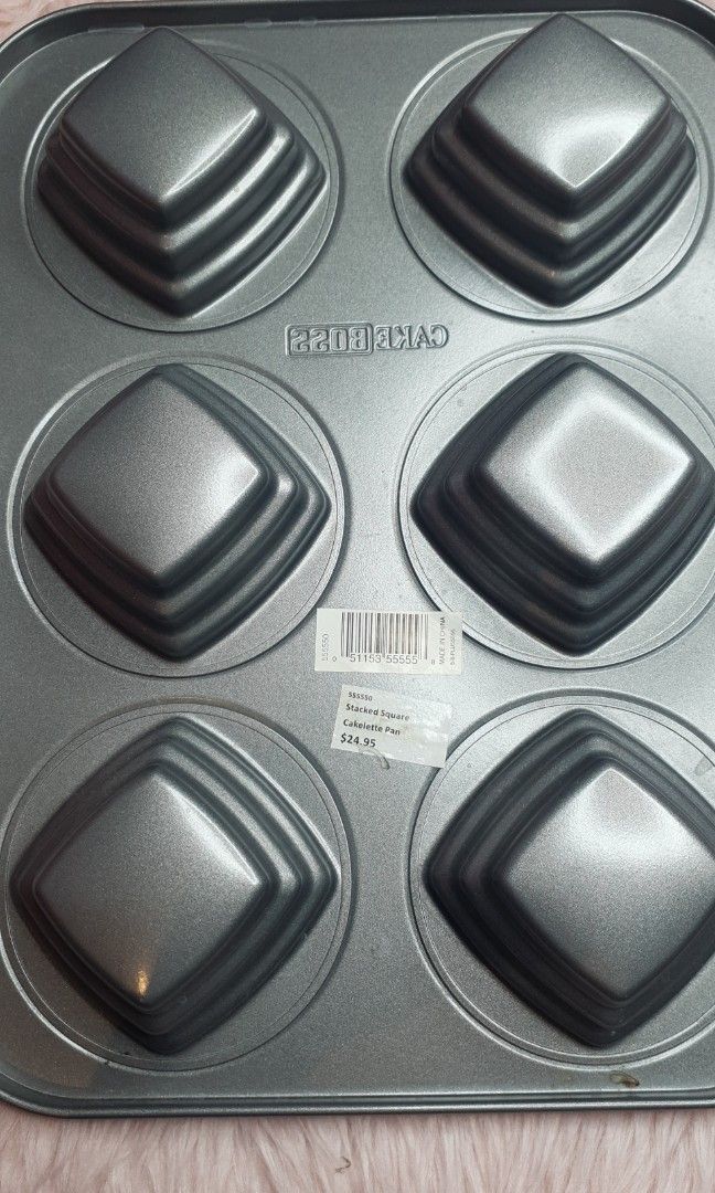 CAKE BOSS Non stick Mini Cake Baking Tray (Category: Bakeware) located in Santa Rosa. Submitted by fairygalesclothestation25 (Listing ID 1228514595, Image 2). Description: used once authentic Cake boss baking tray from US.