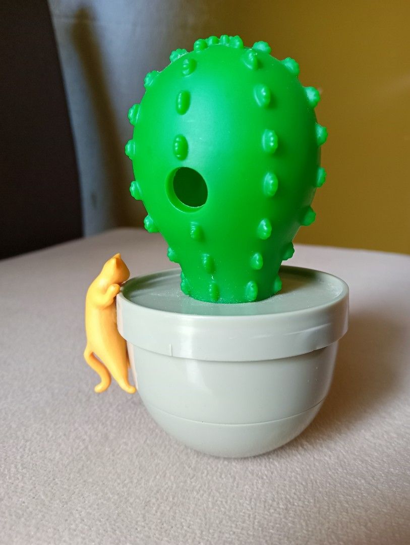 Interactive cat toy with treat dispenser and catnip compartment, Pet