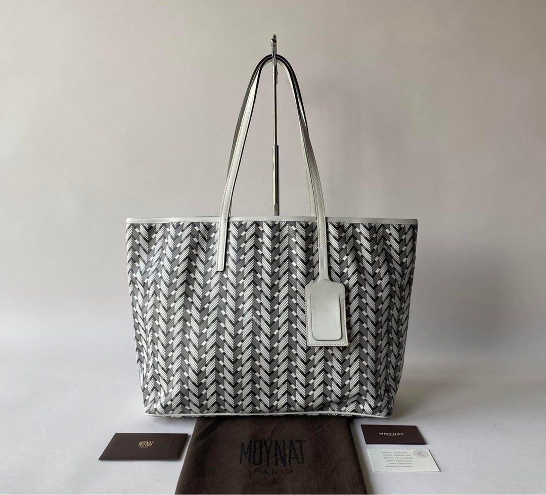 MOYNAT RIVAGE CABAS TOTE (Category: Luxury Bags & Wallets) located in Manila. Submitted by bagislifeshop (Listing ID 1228548103, Image 1). Description: 99% NEW MOYNAT RIVAGE CABAS TOTE Ultralight Handcrafted Cabas Tote Black & Grey Chevron Effect Iconic M Monogram & Logo White Calfskin Leather Dimensions-13.8”×10.5”×5” Handle Drop-8” Good As New, Rank SA Comes w/ Cards & Dustbag .