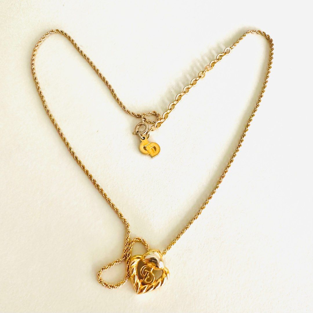 Monogram locket necklace, Luxury, Accessories on Carousell