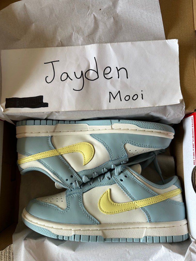 Blue nikes top with yellow swoosh