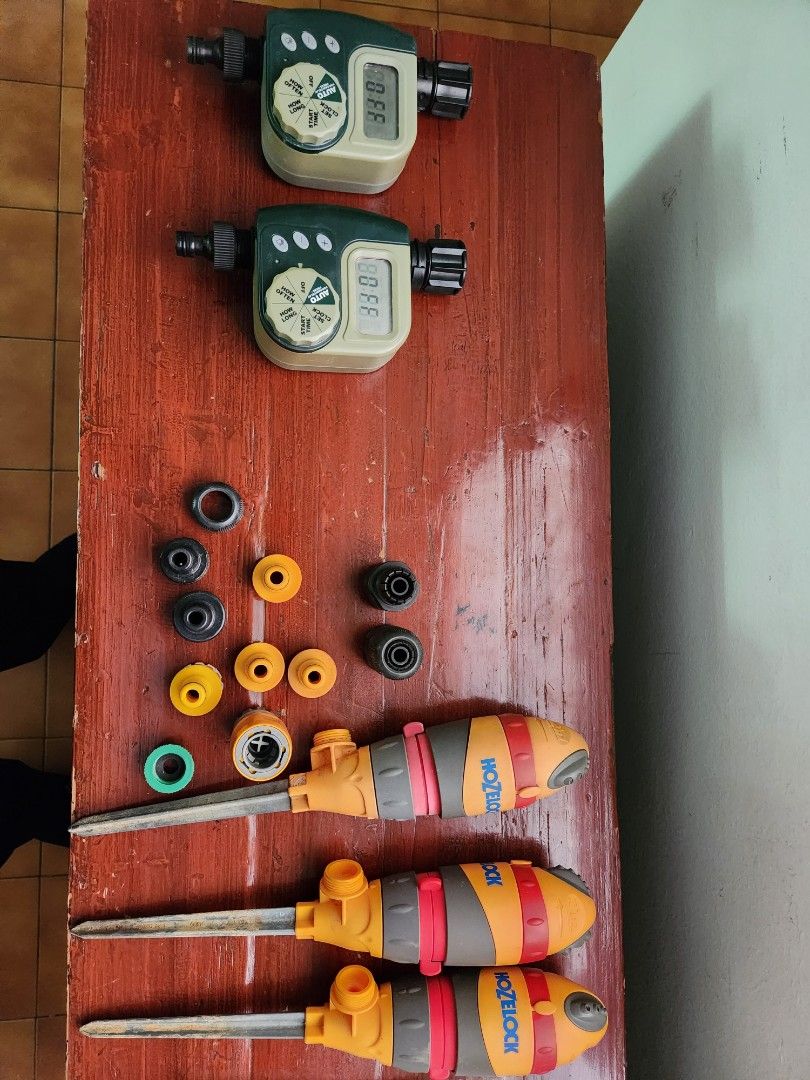 Automated watering 2 single hose water timers 3 gear drive