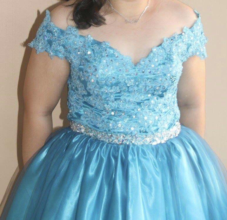 Blue Off shoulder Cocktail Dress (Category: Evening dresses & gowns) located in Quezon City. Submitted by trisha_1998 (Listing ID 1228597384, Image 2). Description: Teal Blue Cocktail Dress Off shoulder, knee length Used once only for a debut Fits medium to large In very good condition PM for inquiries ☺️.