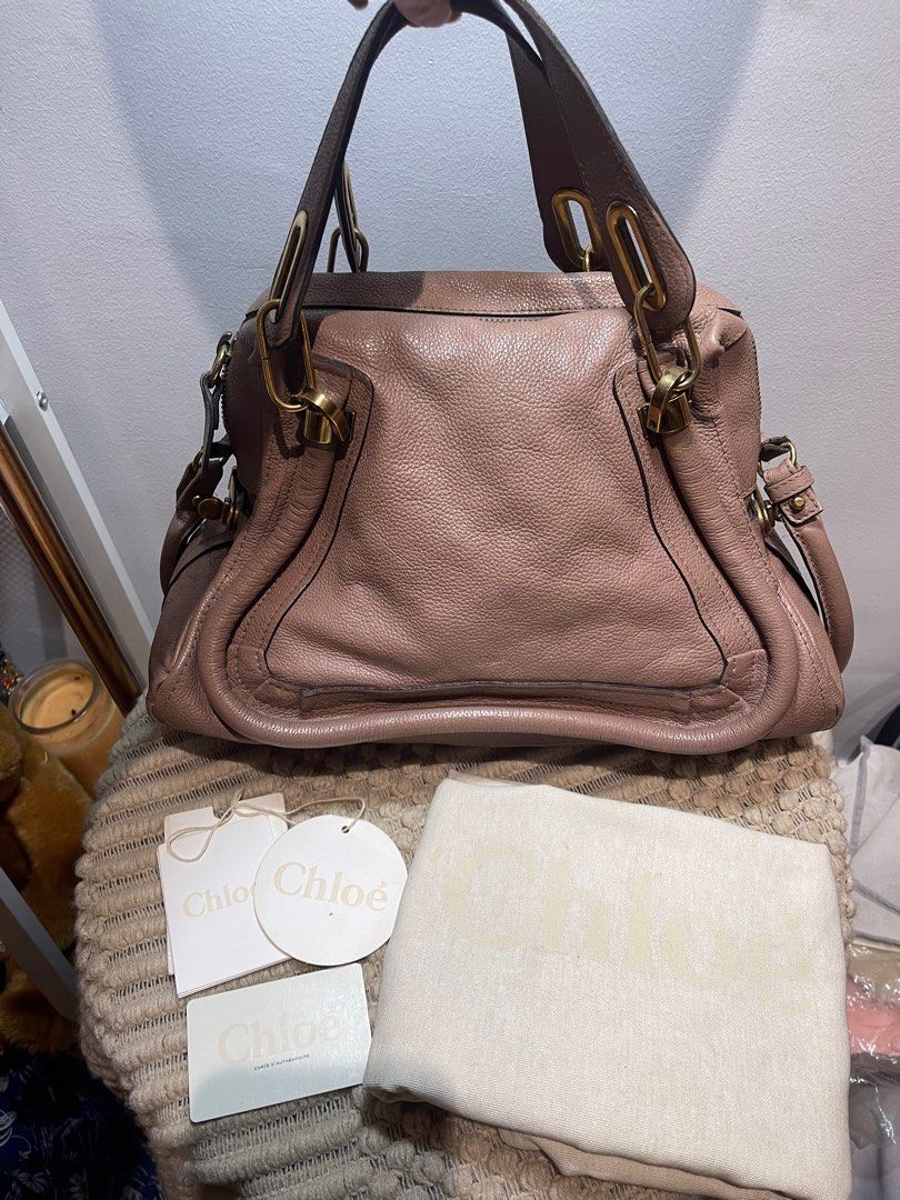 Chloe Paraty Medium in Mauve (Category: Luxury Bags & Wallets) located in Makati City. Submitted by irenerv (Listing ID 1228708275, Image 1). Description: Chloe Paraty Medium in Mauve Includes: Orig Dustbag, Info Booklet Exterior Material: Leather Interior Material: Fabric Hardware: Gold-tone Length: 37 cm Width: 15 cm Height: 25 cm Handle Drop: 13.5 cm Shoulder Strap: 38.5 cm.