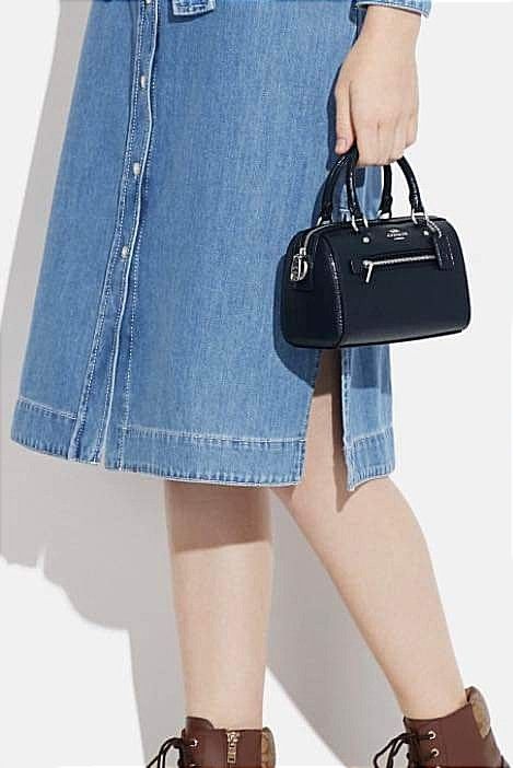COACH Patent Leather Mini Rowan Crossbody (Category: Luxury Bags & Wallets) located in Dagupan City. Submitted by mrsrraga (Listing ID 1228577967, Image 3). Description: ✅Guaranteed 💯 Authentic from Canada Color: Silver/Midnight Navy MOP: Gcash only Product Details: - Patent crossgrain leather and smooth leather - Two credit card slots - Zip-top closure, fabric lining - Handles with 2 3/4" drop - Outside zip pocket - Detachable strap with 23 1/2