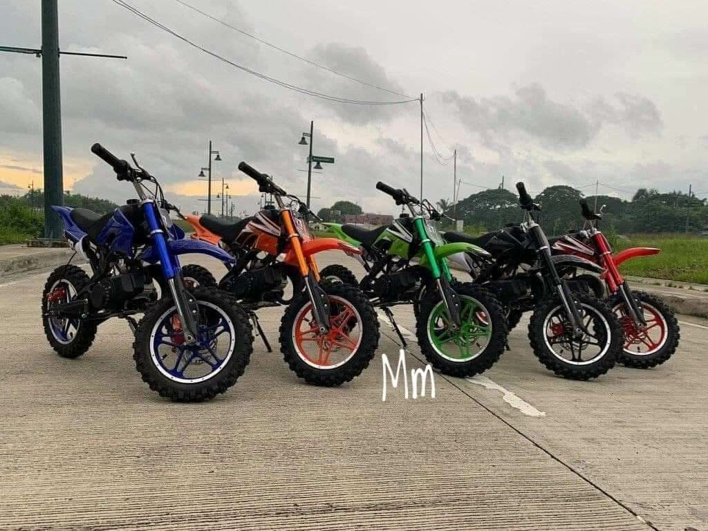 Enduro 27 (Category: Bicycles) located in Manila. Submitted by minidivisoria (Listing ID 1228701320, Image 3). Description: ₱6,700 add 200 for assemble Enduro 27 (49cc Dirt Bike Gas Type)Good For Kids And Adult * Heavy Duty Specification: Fold metal pedals Front and rear disc brakes lAluminum racing exhaust Easy pull starter Mud profile tires Thickened Tires Upgraded telescopic front shock absorber Engine: 49cc 2 stroke air cooled Performance: 3.