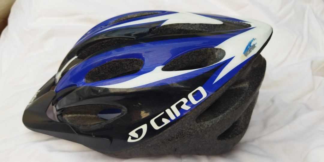 GIRO Indicator MTB mountain bike helmet (Category: Bicycles) located in Malabon City. Submitted by immortalpicker (Listing ID 1228581728, Image 3). Description: GIRO Indicator MTB mountain bike helmet Brand=GIRO Model= indicator bike helmet size Adult= 54-61 cm Color= black blue white Weight= 304g 2nd hand with scratch No warranty If there's Damage or Issues they can be seen in the last picture Price = 1,700 No swapping please. Price does not inc