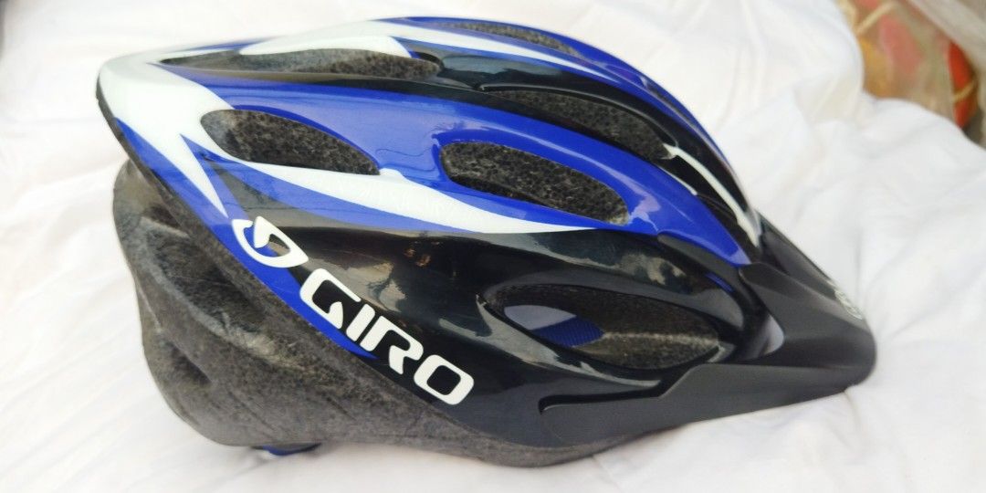 GIRO Indicator MTB mountain bike helmet (Category: Bicycles) located in Malabon City. Submitted by immortalpicker (Listing ID 1228581728, Image 1). Description: GIRO Indicator MTB mountain bike helmet Brand=GIRO Model= indicator bike helmet size Adult= 54-61 cm Color= black blue white Weight= 304g 2nd hand with scratch No warranty If there's Damage or Issues they can be seen in the last picture Price = 1,700 No swapping please. Price does not inc