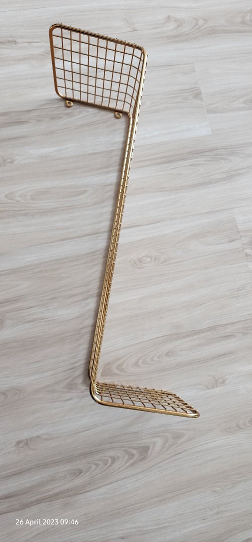 IKEA gold wall shelf on Carousell