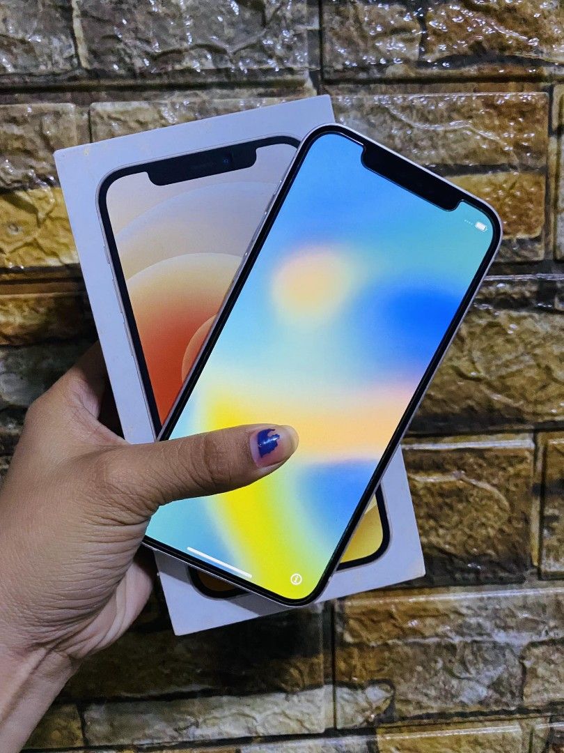 Iphone 12 (Category: iPhone 12 Series) located in Manila. Submitted by skychoochoo (Listing ID 1228574502, Image 2). Description: For sale or swap Iphone 12 64gb Globelock 22k selling 24k swapping No issue Makinis 99% smooth Complete package Check all you want Truetone ok Face id ok Manila area or nearby meet up Pwede sa malayo add na lang df.