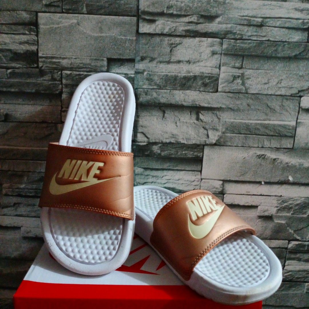 Nike slippers rose gold online