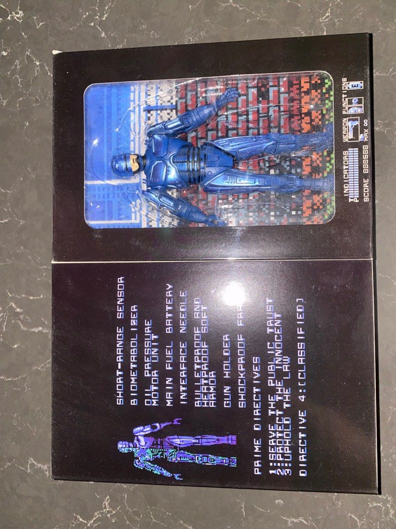 Robocop NECA video game appearance (Category: Figurines & Statues) located in Taguig. Submitted by randomshopnipaul (Listing ID 1228706186, Image 2). Description: Robocop 8bit video game appearance collectible Metro Manila MOP: gcash Buyer will shoulder shipping fee.