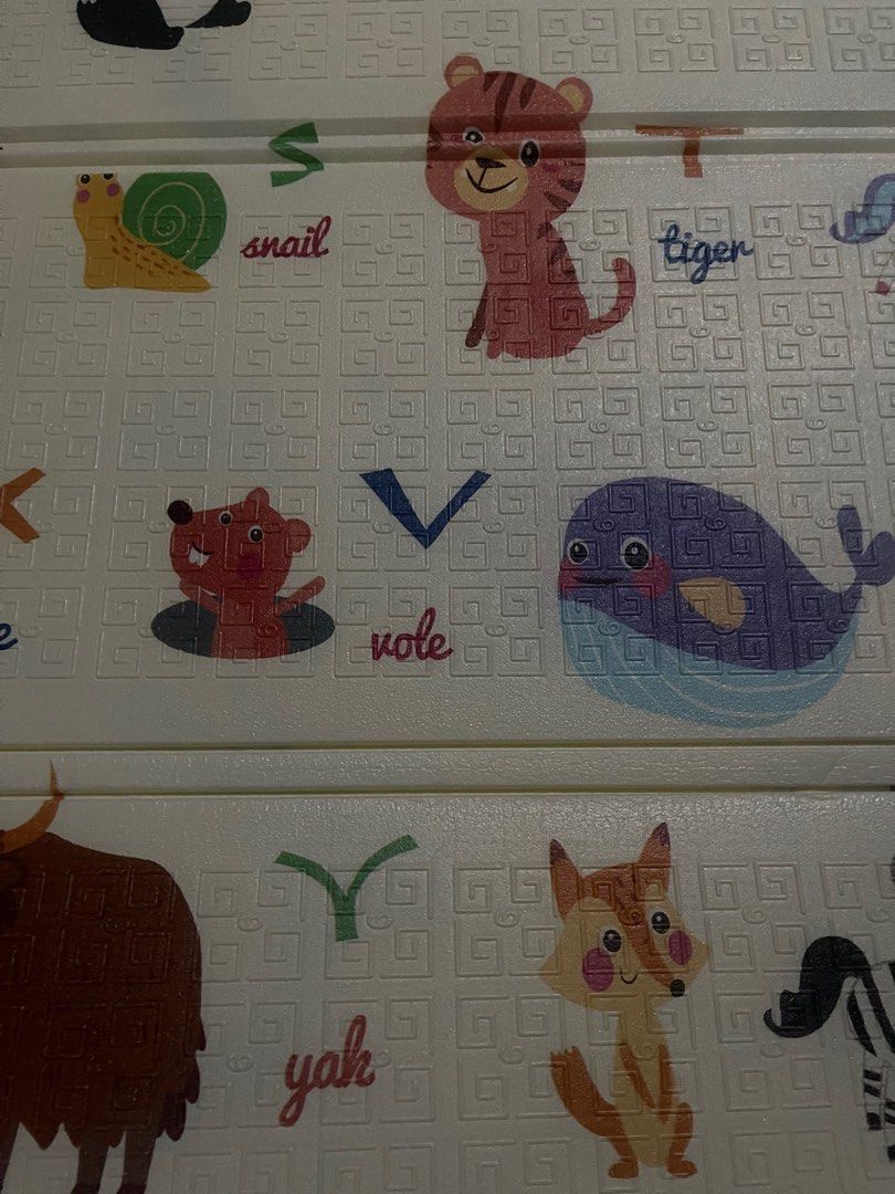 Unused baby mat (Category: Changing Mats & Accessories) located in Quezon City. Submitted by abygeg (Listing ID 1228609616, Image 2). Description: Unused reversible baby mat. Size: .
