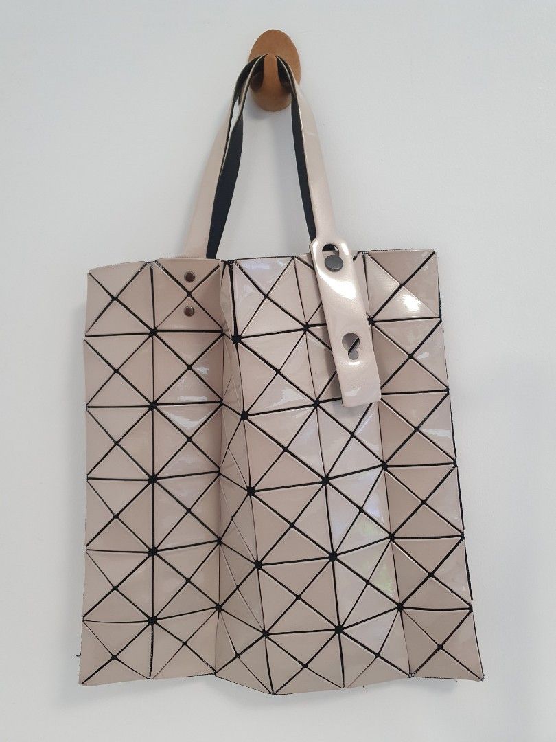 AUTHENTIC BAOBAO Issey Miyake / NOT THRIFTED (Category: Luxury Bags & Wallets) located in Bulacan. Submitted by fazzauthenticgoods (Listing ID 1228809565, Image 3). Description: NOT THRIFTED my ninong bought this at japan for me authentic rubbings lang sa shoulder pink dot sa likod sign of usage sa corners no major flaws PM FOR MORE DETAILS❤️.