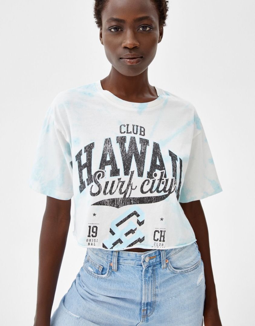 BERSHKA Tie Dye Blue White Statement Printed Graphic Tee Hanging
