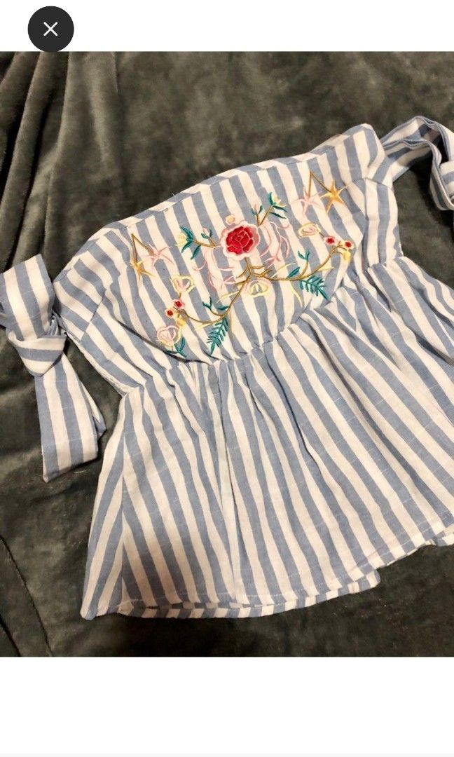 Blue beach top with tie (Category: Sleeveless) located in Taguig. Submitted by swiftgem (Listing ID 1228807145, Image 2). Description: blue top for the beach or casual gala with embroidered design ribbon tie for the sleeves XS to Semi M RFS: need funds, decluterring.