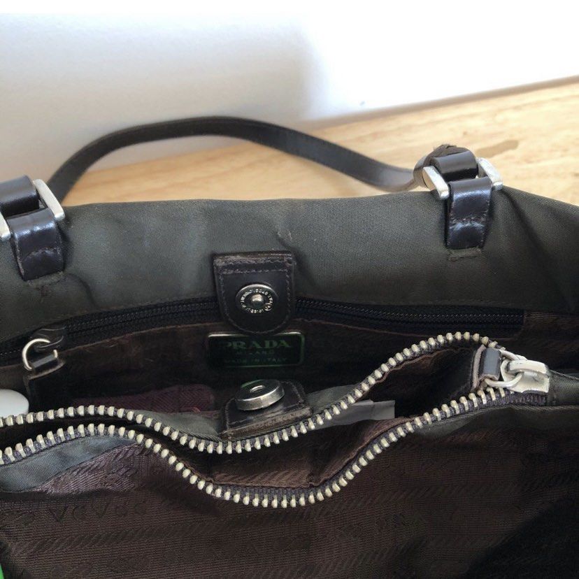 Prada Nylon Bag (Category: Luxury Bags & Wallets) located in Las Pinas. Submitted by decluttxrstudios (Listing ID 1228835047, Image 3). Description: middle zipper needs repair (last photo) signs of usage .