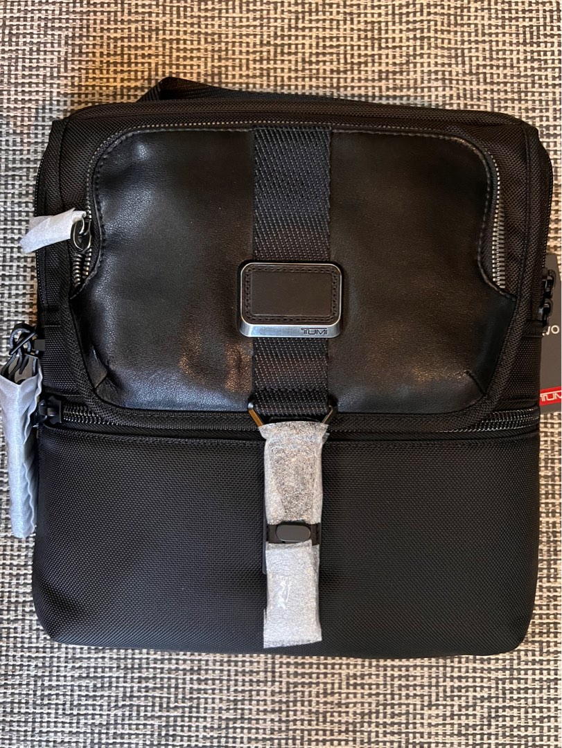 Tumi arnold best sale zip flap crossbody