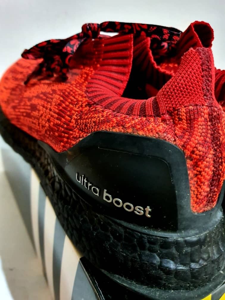 Ultra boost uncaged solar red store