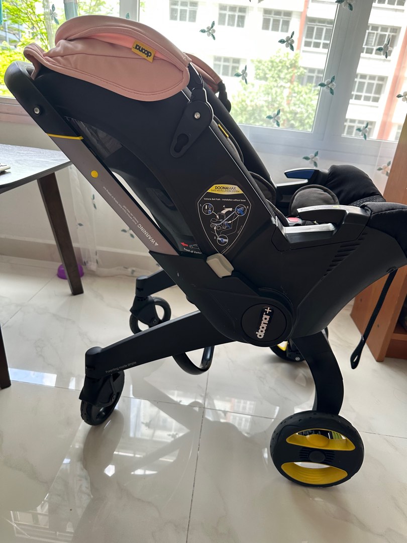 Doona car seat with base, Babies & Kids, Going Out, Car Seats on Carousell