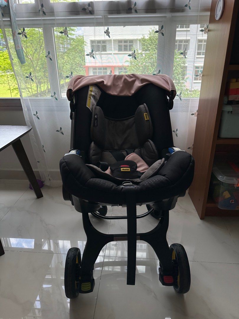 Doona car seat with base, Babies & Kids, Going Out, Car Seats on Carousell