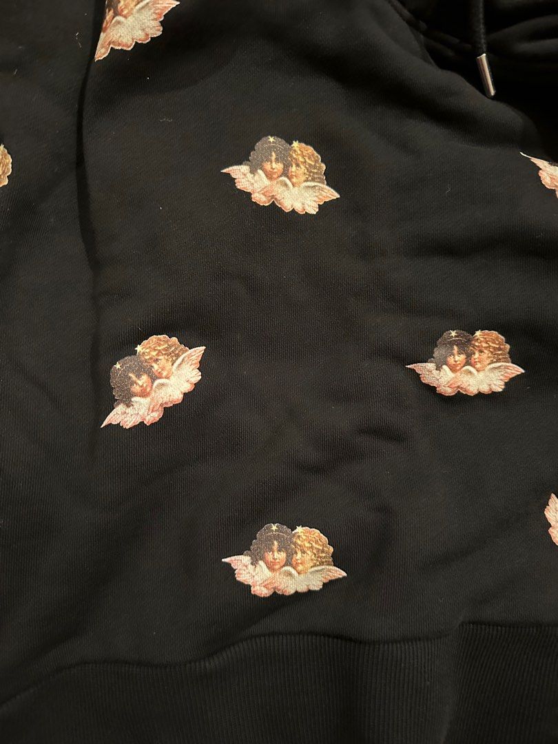 FIORUCCI cropped black hoodie (Category: Coats, Jackets and Outerwear) located in Makati City. Submitted by chelsmmm (Listing ID 1228992777, Image 2). Description: No haggling Original price 180€ AUTHENTIC FIORUCCI Cropped hoodie with the iconic angels! RFS - not my style anymore .
