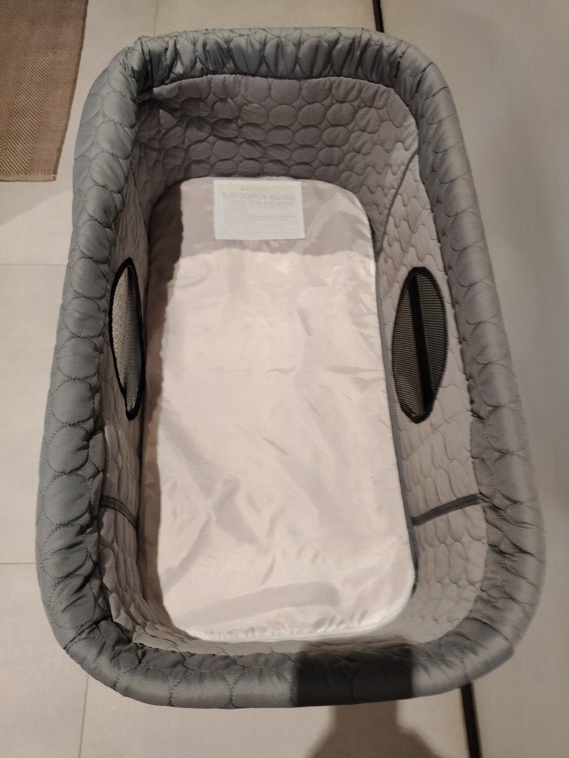 Green store frog bassinet
