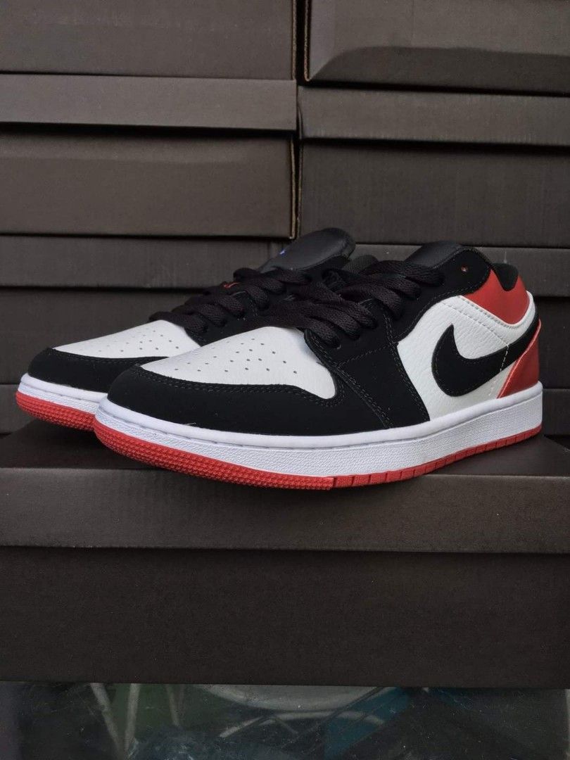 j1 low black toe price