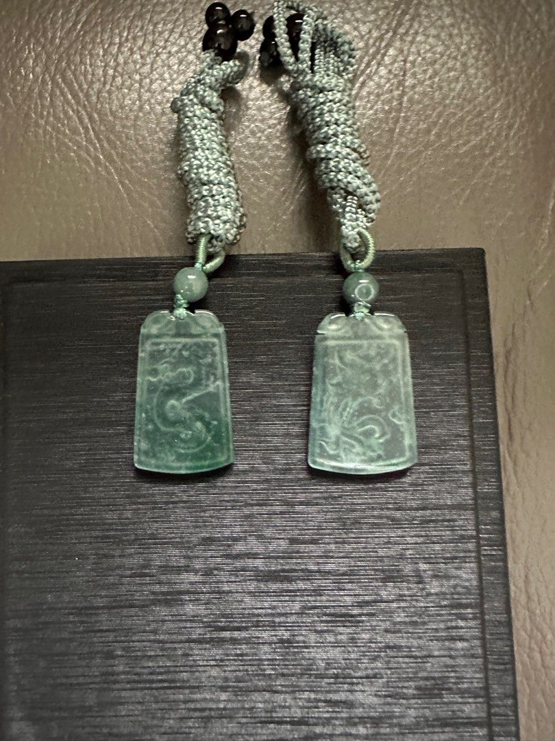 Certified Natural Grade A Dragon Phoenix Pair Jadeite 龙鳳蜚翠 (Category: Precious Stones) located in Singapore. Submitted by starariez.atelier (Listing ID 1229036108, Image 2). Description: A Pair of Dragon and Phoenix Genuine Natural Grade “A” Jade Pendant. Excellent Craving. Nice Icy Green colour This is a pair of nice pieces and the size is small and delicate. Measurement : 20mm x 30.2mm x 2.2mm and 19mm x 28.6mm x 2.4mm Message me if you need mo