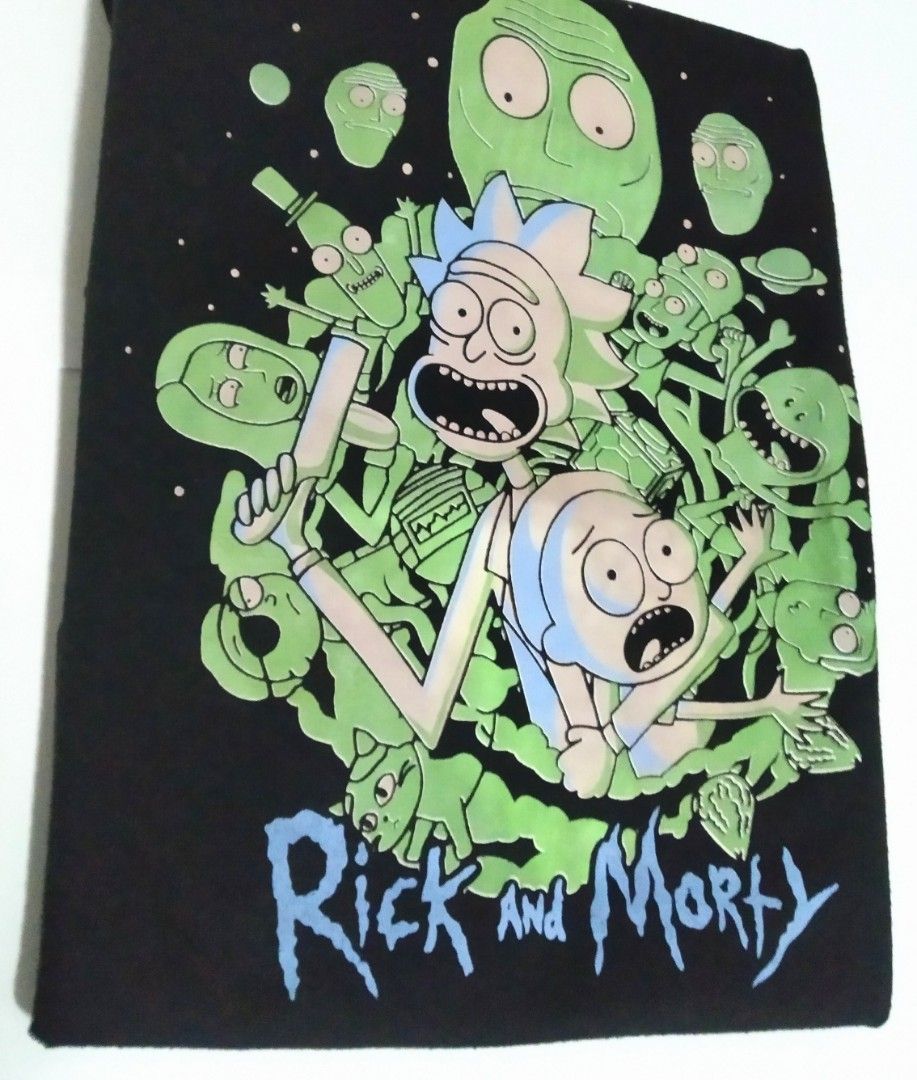 Rick and Morty Graphic Tee (Category: Tshirts & Polo Shirts ) located in Paranaque City. Submitted by cinalear (Listing ID 1228926572, Image 2). Description: Bought in a convention - used only once and stored for a while. Size: XS Length: 24 in. Shoulders: 16 in. RFS: Moving - need funds MOP: GCash MOD: GGX or GrabExpress LOC: Las Piñas.