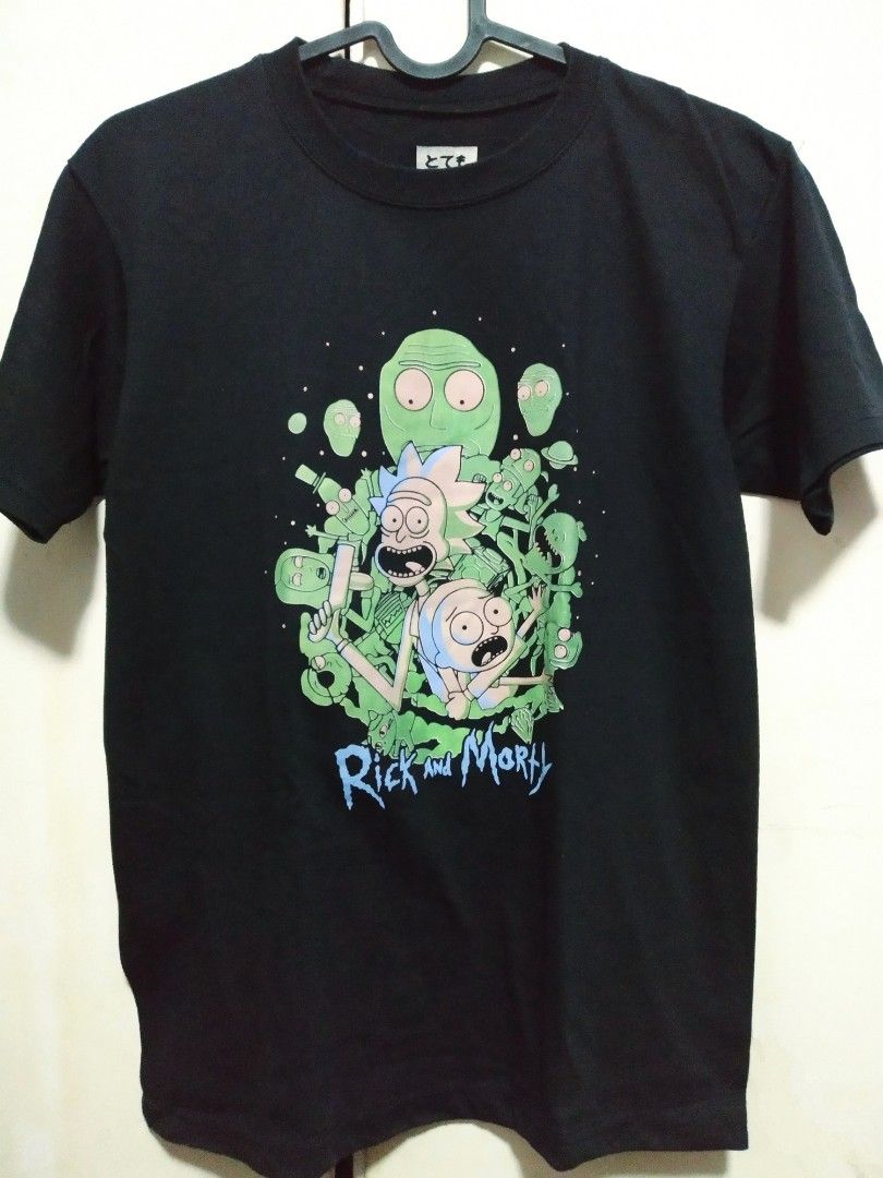 Rick and Morty Graphic Tee (Category: Tshirts & Polo Shirts ) located in Paranaque City. Submitted by cinalear (Listing ID 1228926572, Image 1). Description: Bought in a convention - used only once and stored for a while. Size: XS Length: 24 in. Shoulders: 16 in. RFS: Moving - need funds MOP: GCash MOD: GGX or GrabExpress LOC: Las Piñas.