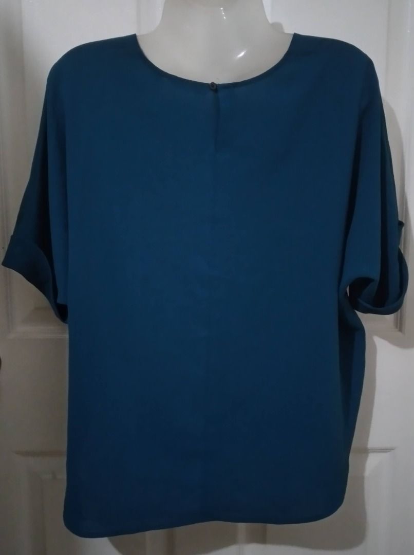 Uniqlo teal blouse/top L (Category: Blouses) located in Antipolo. Submitted by cychiyo (Listing ID 1229059681, Image 2). Description: BNWOT Uniqlo teal blouse /top Large on tag cuffed sleeves shop-bought new at Uniqlo UP Town Center used once for half a day; practically new no issues at all already washed and clean, ready to wear kept well last price posted; please offer price listed. thanks.