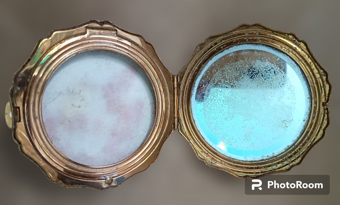 1950s Vintage Reusable Stratton Compact Powder Case (Category: Makeup) located in Las Pinas. Submitted by mirlynncurioshop (Listing ID 1229094705, Image 2). Description: Stratton c1950s ladies powder compact in the marble effect design, with original features. The mirror has some spots the gold gilt of the case has some fading due to age. Overall, the item is intact, no loose or broken parts, and can be used as a decorative or functional compact 