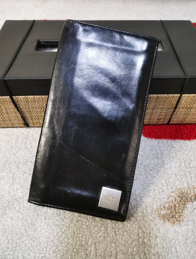 💯CELINE Men's Wallet (Category: Luxury Bags & Wallets) located in Cainta. Submitted by phengaying (Listing ID 1229086441, Image 1). Description: Original Celine Paris Men's Semi-Long Wallet | Genuine Soft Leather | 5 Card-Slot |3 Bills Compartment | No Other Inclusion | Preowned in 8/10 Condition Flaw/s: Fading on hardware & some minor visible folds.