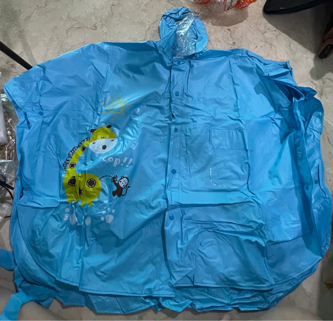 Jas hujan anak raincoat model poncho biru miniso on Carousell