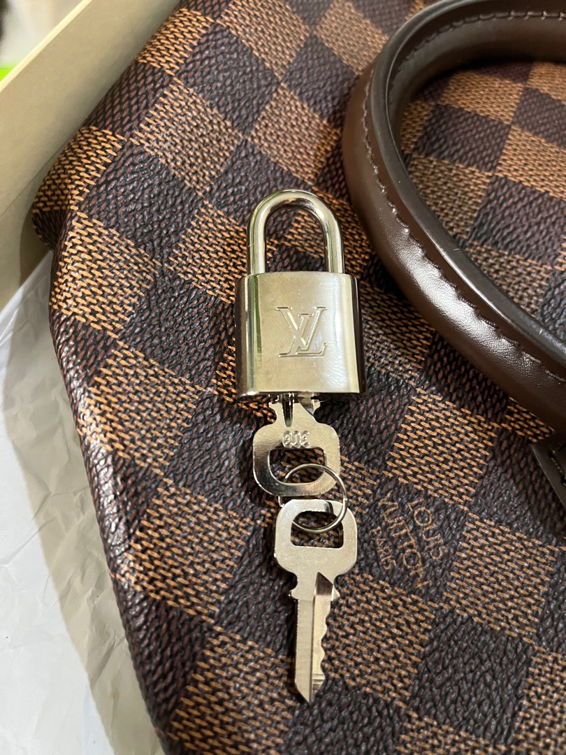 Louis Vuitton Silver Padlock, Luxury, Bags & Wallets on Carousell