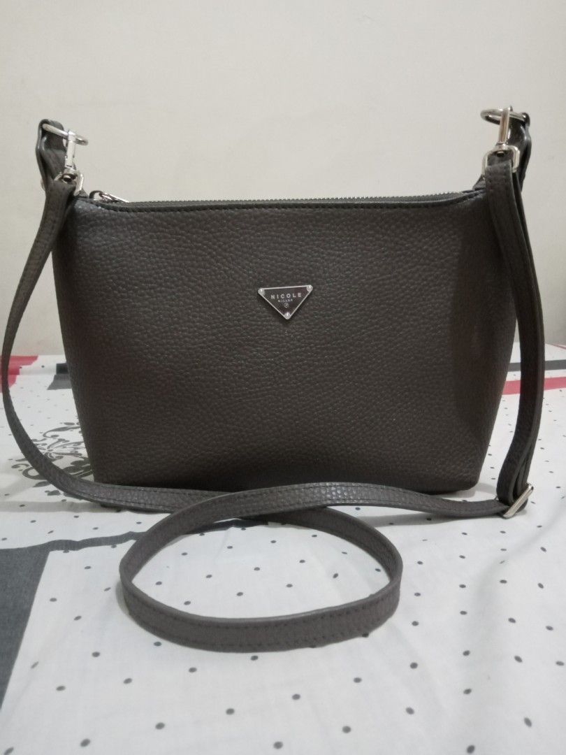 Nicole Miller crossbody bag (Category: Cross-body Bags) located in Antipolo. Submitted by cone0812 (Listing ID 1229128103, Image 1). Description: NicOle Miller crossbody bag Almost new, no flaws RFS:Closet downsizing.