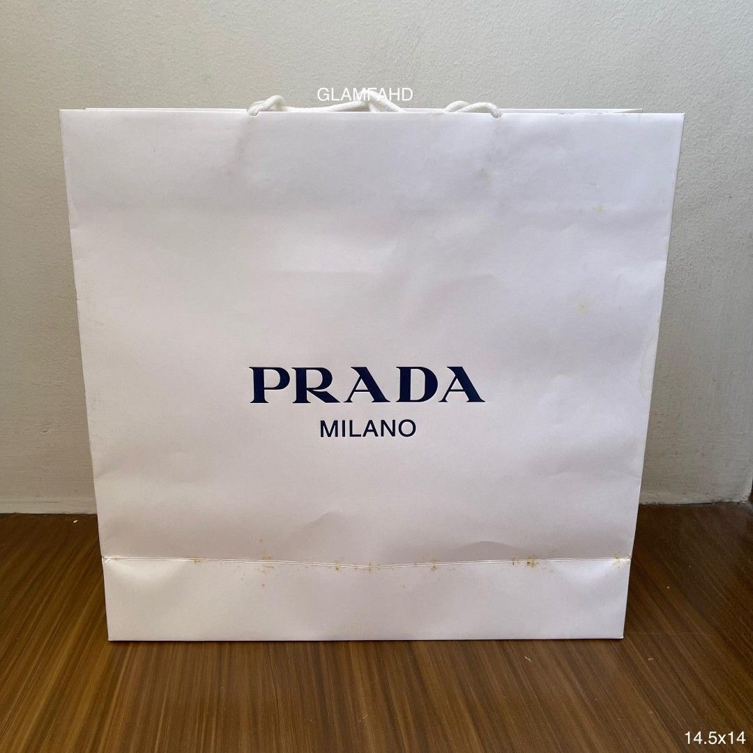 Pre Owned Authentic PRADA Paperbag (Category: Luxury Bags & Wallets) located in Paranaque City. Submitted by Glamfahd (Listing ID 1229239292, Image 1). Description: PRE OWNED AUTHENTIC PRADA PAPERBAG Features Size 14.5x14 inches Condition With marks/dirt Please see photos to appreciate.