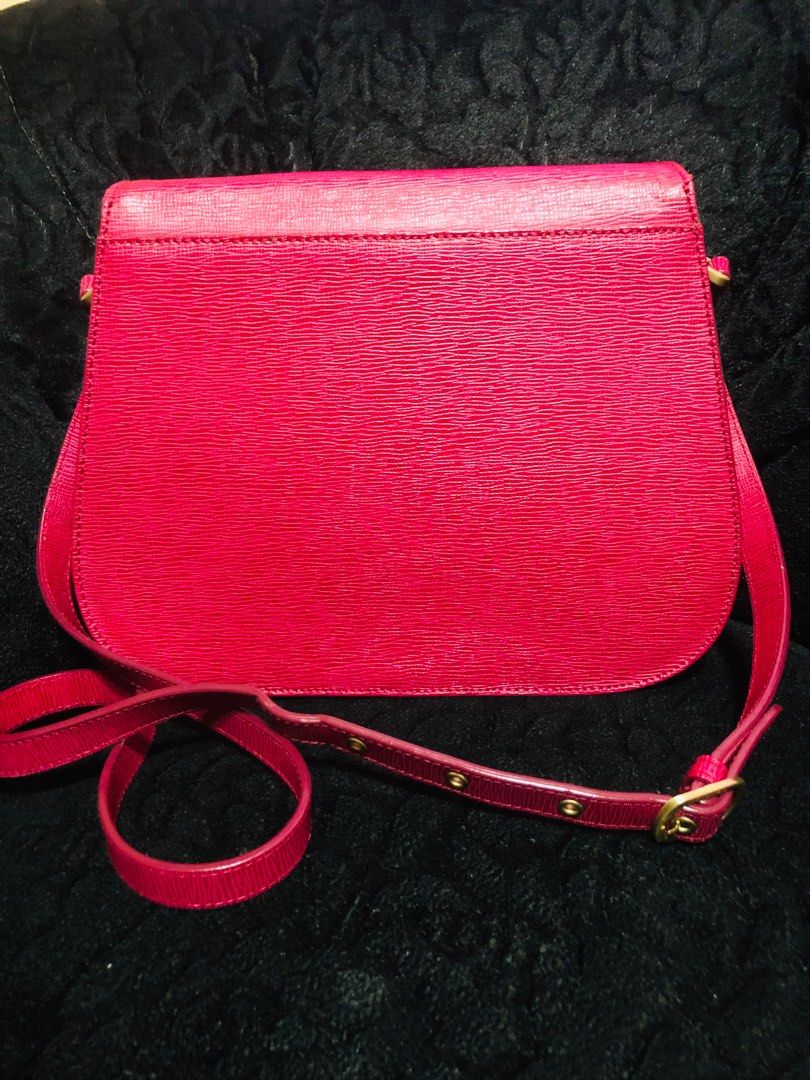 SISLEY Crossbody Bag (Category: Cross-body Bags) located in Cavite. Submitted by gjenvyrose-49908 (Listing ID 1229115915, Image 2). Description: SALE‼️ SALE‼️ SALE ‼️ PRELOVED BRANDED BAG brand: SISLEY color: HOT PINK type: Crossbody Bag • 💯% original • 9/10 condition • minimal signs of wear • structured/ stand alone bag • brass gold hardwares • naka sisley ang puller • naka heat stamp sa loob • with eteketa • nakahologram • adjustable belt type